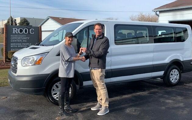 Patrick Christensen donating the van to the Hands of Opportunity Center